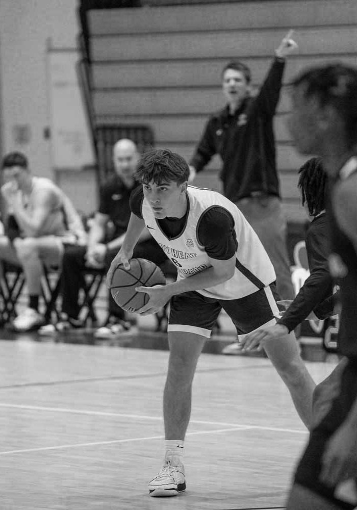 UNRNKD Hoops Indianapolis Basketball Academy will host Indy Heat Gym Rats image shows player with ball